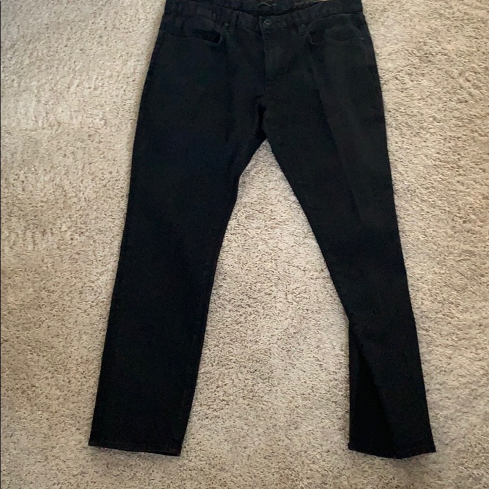 Men’s black jeans.
